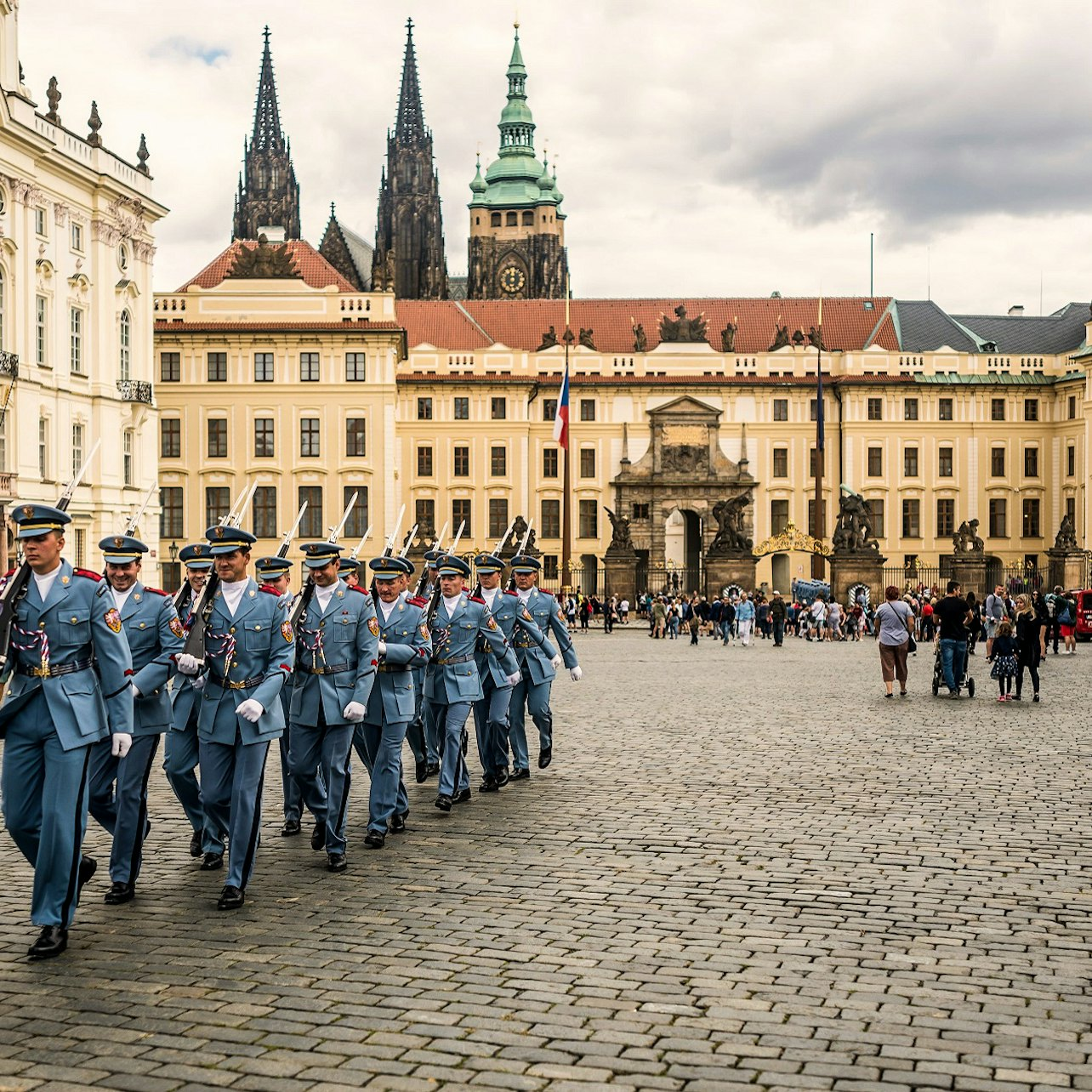 Marching guards and timeless architecture come together at Prague Castle showcasing a unique blend of history and culture while offering stunning views across the city’s historic landscape.